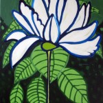 white lotus on green leafy background